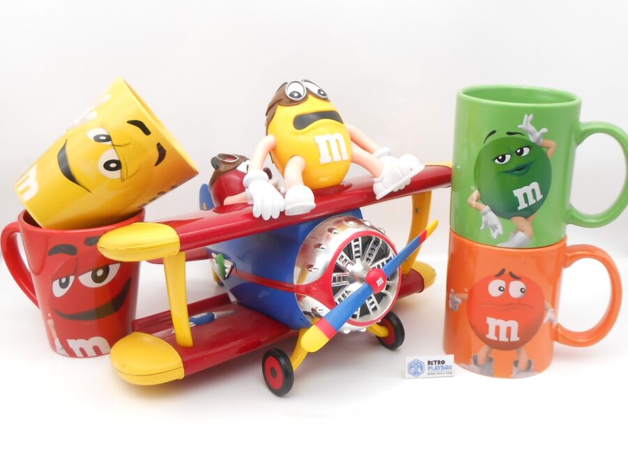 M&M Set! 4 Tassen und Smartis Spender Flugzeug Bonbonspender Sammler